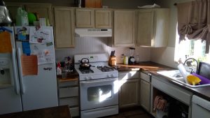 Kitchen Cabinet Painting Before by CertaPro Painters of Spokane, WA